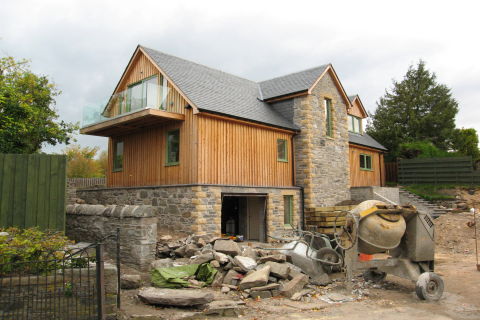 Rosemount Highlands new split level house design stone larch cladding